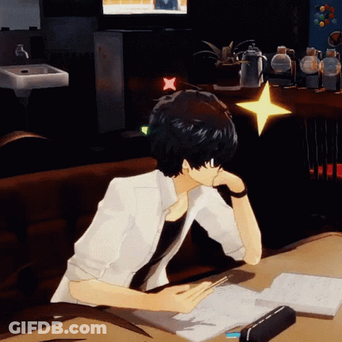 A Man Is Sitting At A Desk With A Book And A Star On His Head GIF