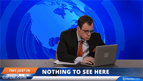 A Man Is Sitting At A Desk With A Laptop In Front Of A Nothing To See Here Banner GIF