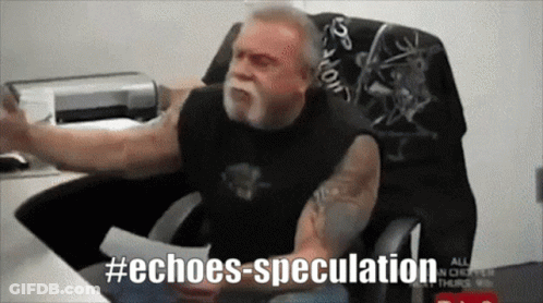 A Man Is Sitting At A Desk With His Arms Outstretched And The Hashtag Echoes Speculation GIF