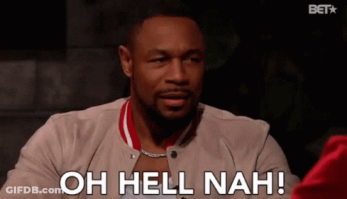 A Man Is Sitting At A Table And Says Oh Hell Nah GIF