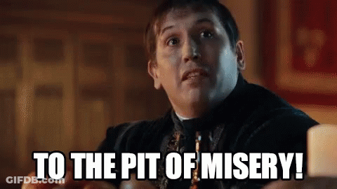 A Man Is Sitting At A Table And Says `` To The Pit Of Misery '' . GIF