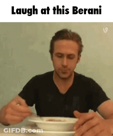 A Man Is Sitting At A Table Eating A Bowl Of Soup With The Caption Laugh At This Berani GIF