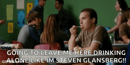 A Man Is Sitting At A Table With A Fork In His Mouth And A Caption That Says Going To Leave Me Here Drinking GIF