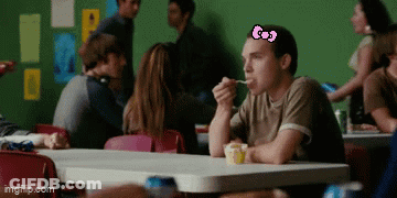 Man With Hello Kitty Bow Eating Ice Cream GIF