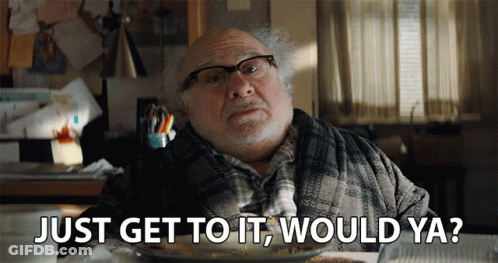 A Man Is Sitting At A Table With A Plate Of Food And Says Just Get To It Would Ya GIF