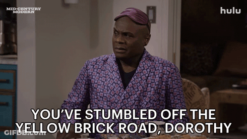 A Man Is Sitting At A Table With A Plate Of Food And Says You 'Ve Stumbled Off The Yellow Brick Road GIF