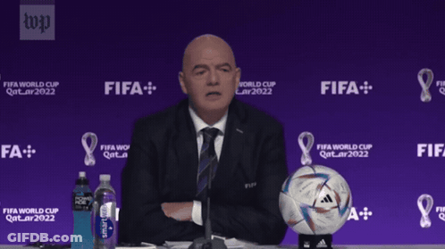 A Man Is Sitting At A Table With A Soccer Ball And Says " Today I Feel " GIF