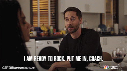 A Man Is Sitting At A Table With A Woman And Says " I Am Ready To Rock " GIF