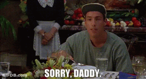 A Man Is Sitting At A Table With A Woman Behind Him And Says Sorry Daddy GIF