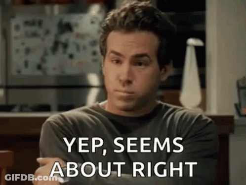 A Man Is Sitting At A Table With His Arms Crossed And Says `` Yep , Seems About Right '' GIF