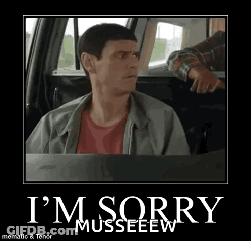 A Man Is Sitting In A Car With A Poster That Says `` I 'M Sorry '' . GIF