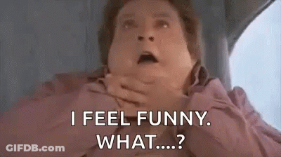 A Man Is Sitting In A Car With His Hands On His Mouth And Says `` I Feel Funny . What ... ? '' GIF