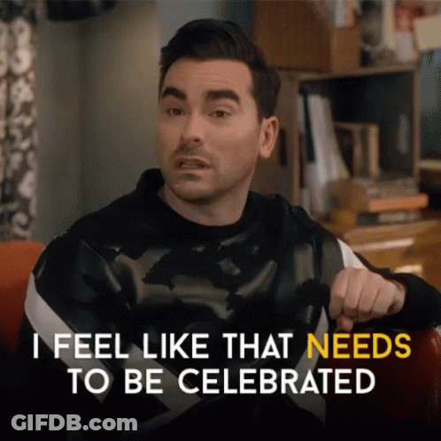 A Man Is Sitting In A Chair And Saying I Feel Like That Needs To Be Celebrated GIF