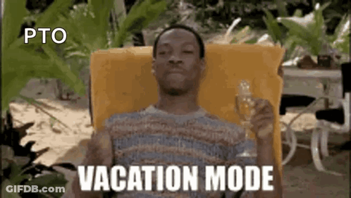 A Man Is Sitting In A Chair Holding A Glass Of Wine And Says Vacation Mode . GIF