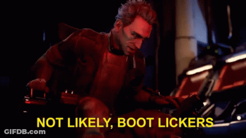 A Man Is Sitting In A Chair In A Dark Room With A Red Light Behind Him . GIF