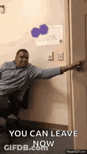 A Man Is Sitting In A Chair In Front Of A Door And Says You Can Leave Now GIF
