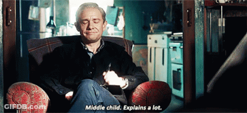 A Man Is Sitting In A Chair With His Eyes Closed And Says Middle Child Explains A Lot . GIF