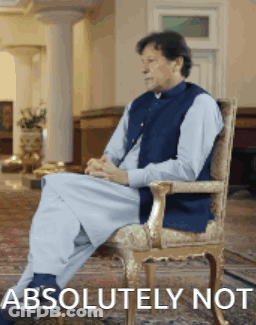 A Man Is Sitting In A Chair With The Words Absolutely Not Written Below Him GIF