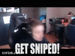 A Man Is Sitting In A Chair With The Words Get Sniped On The Bottom GIF