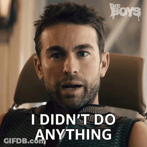 A Man Is Sitting In A Chair With The Words I Did N't Do Anything Behind Him GIF
