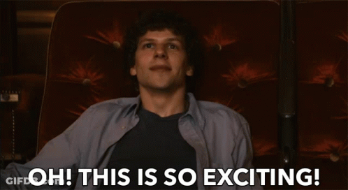 A Man Is Sitting In A Chair With The Words Oh This Is So Exciting Behind Him GIF