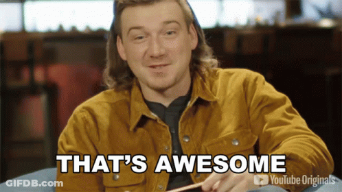 A Man Is Sitting In A Chair With The Words That 'S Awesome On The Bottom GIF