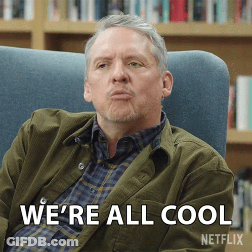 A Man Is Sitting In A Chair With The Words We 'Re All Cool On The Bottom GIF