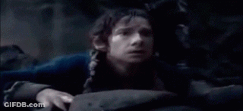 A Man Is Sitting In A Dark Room Asking What Have You Done . GIF