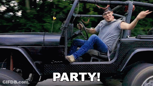 A Man Is Sitting In A Jeep With The Words Party Written On The Side GIF