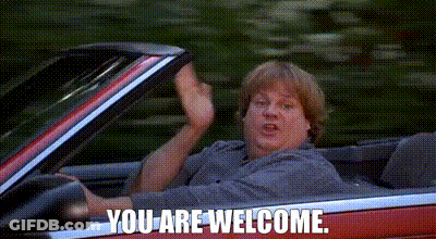 A Man Is Sitting In A Red Convertible Car And Waving . GIF