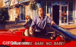 A Man Is Sitting In A Red Sports Car With The Words Babe Babe Babe No Babe GIF