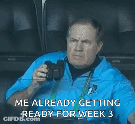 A Man Is Sitting In A Stadium Holding A Camera And Says `` Me Already Getting Ready For Week 3 '' GIF
