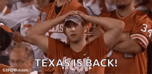 A Man Is Sitting In A Stadium With His Hands On His Head And The Words `` Texas Is Back '' . GIF