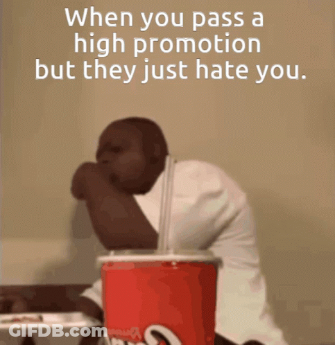 A Man Is Sitting In Front Of A Coca Cola Cup With A Straw GIF