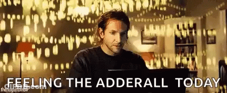 A Man Is Sitting In Front Of A Computer With The Words `` Feeling The Adderall Today '' Written On The Bottom . GIF