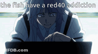 A Man Is Sitting In Front Of A Laptop With The Words The Fish Have A Red40 Addiction Written Above Him GIF