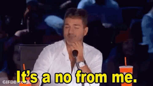A Man Is Sitting In Front Of A Microphone With His Eyes Closed And Saying `` It 'S A No From Me '' . GIF