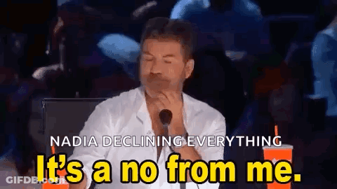 A Man Is Sitting In Front Of A Microphone With His Eyes Closed And Saying `` It 'S A No From Me . '' GIF
