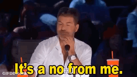 A Man Is Sitting In Front Of A Microphone With His Eyes Closed And Saying `` It 'S A No From Me '' . GIF