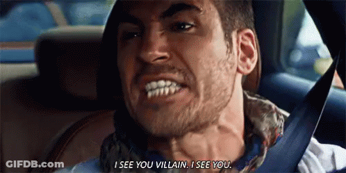 A Man Is Sitting In The Back Seat Of A Car And Saying `` I See You Villain I See You '' . GIF
