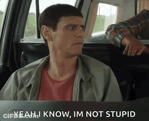 A Man Is Sitting In The Back Seat Of A Car And Saying Yeah I Know , Im Not Stupid . GIF