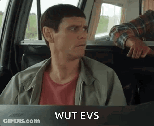 A Man Is Sitting In The Back Seat Of A Car With The Words Wut Evs Written On The Screen . GIF