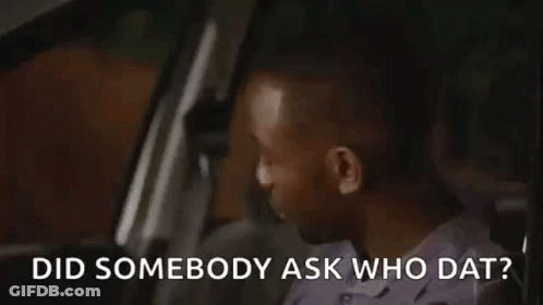 A Man Is Sitting In The Driver 'S Seat Of A Car . GIF