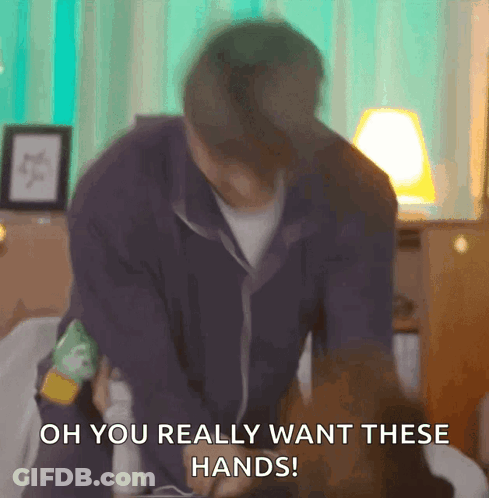 A Man Is Sitting On A Bed And Says Oh You Really Want These Hands . GIF