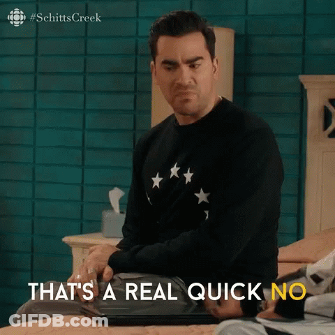 A Man Is Sitting On A Bed With The Words That 'S A Real Quick No GIF