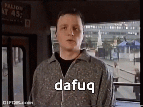 A Man Is Sitting On A Bus And Talking To Someone . GIF
