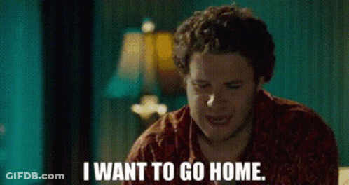A Man Is Sitting On A Couch And Saying `` I Want To Go Home . '' GIF