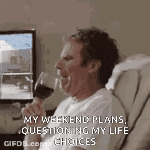 A Man Is Sitting On A Couch Drinking A Glass Of Wine And Saying My Weekend Plans Questioning My Life Choices . GIF