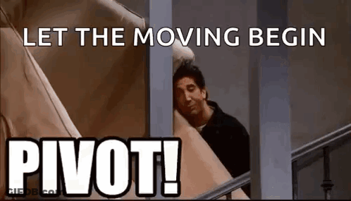 A Man Is Sitting On A Couch In A Room With The Words `` Let The Moving Begin Pivot '' . GIF