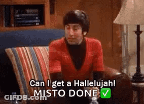 A Man Is Sitting On A Couch Talking About Getting A Hallelujah ! Misto Done . GIF